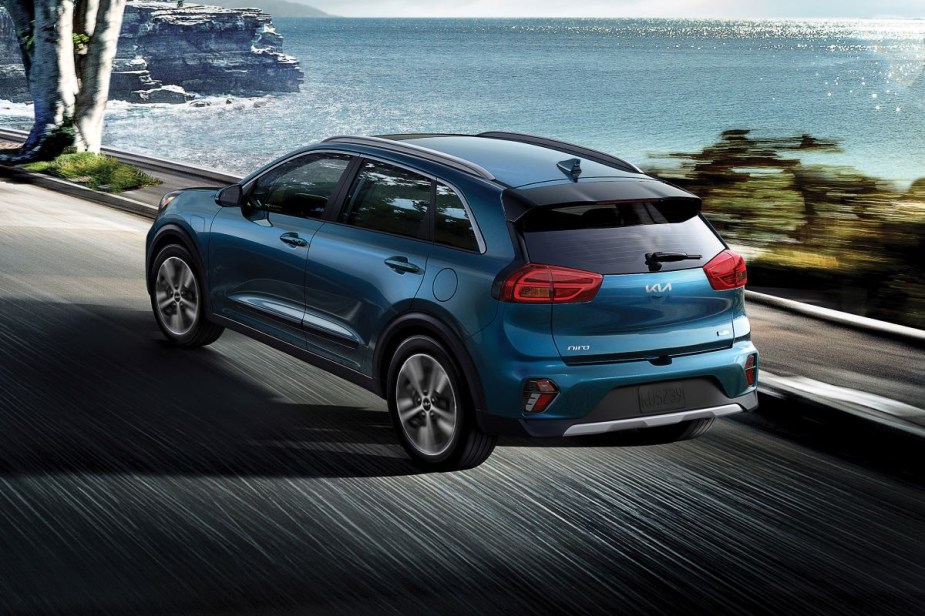 Blue Kia Niro model with available Kia Drive Wise features