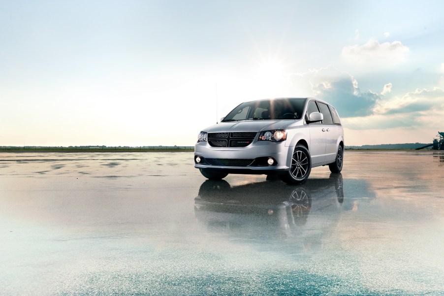 A silver 2019 Dodge Grand Caravan parked near water