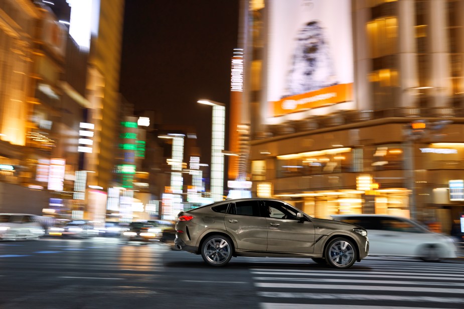 202 BMW X6 in a city at night