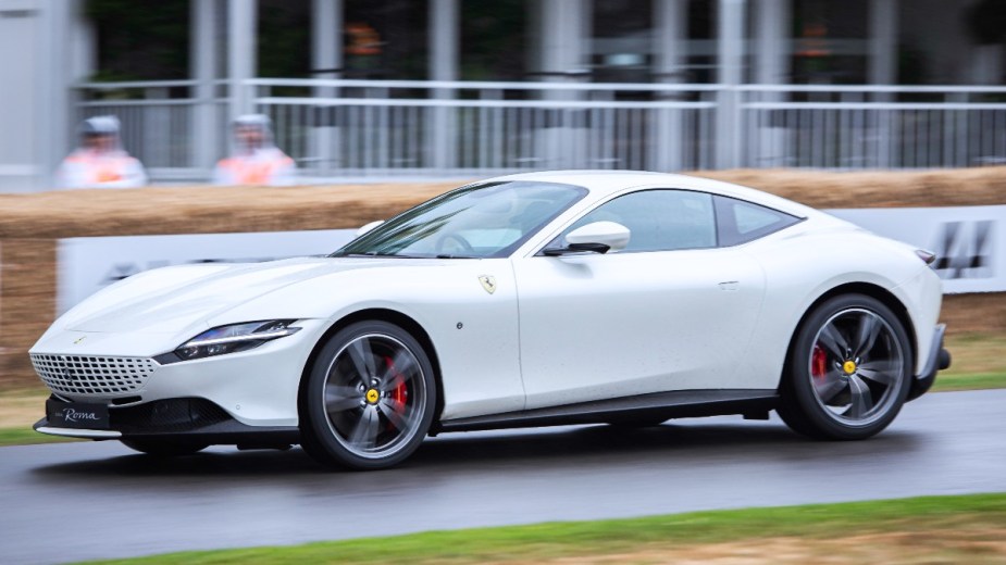 a white 2022 ferrari roma, supercar with four seats