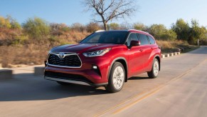 2022 Highlander in red on a road