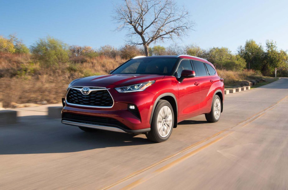 2022 Highlander in red on a road