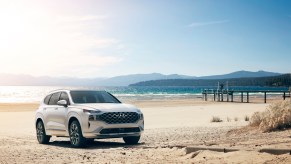 A white 2022 Hyundai Santa Fe at the beach