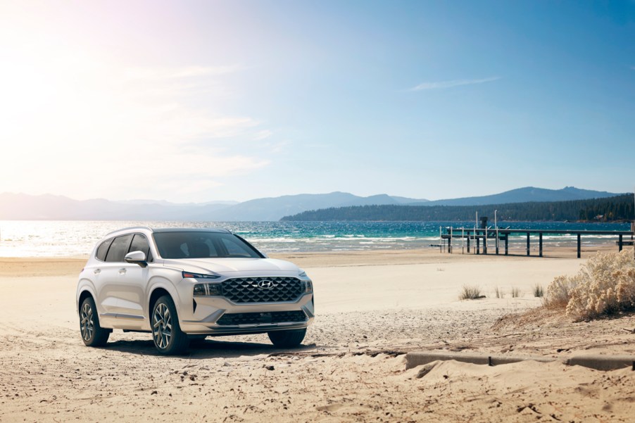 A white 2022 Hyundai Santa Fe at the beach