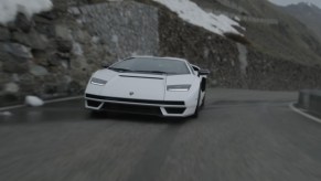 2022 Lamborghini Countach Driving Stelvio Pass in Northern Italy with snow in the background