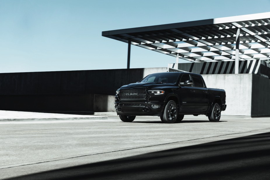 A black ram 1500 limited parked 