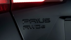 2022 Toyota Prius XLE AWD-e badge on nightshade model all wheel drive car