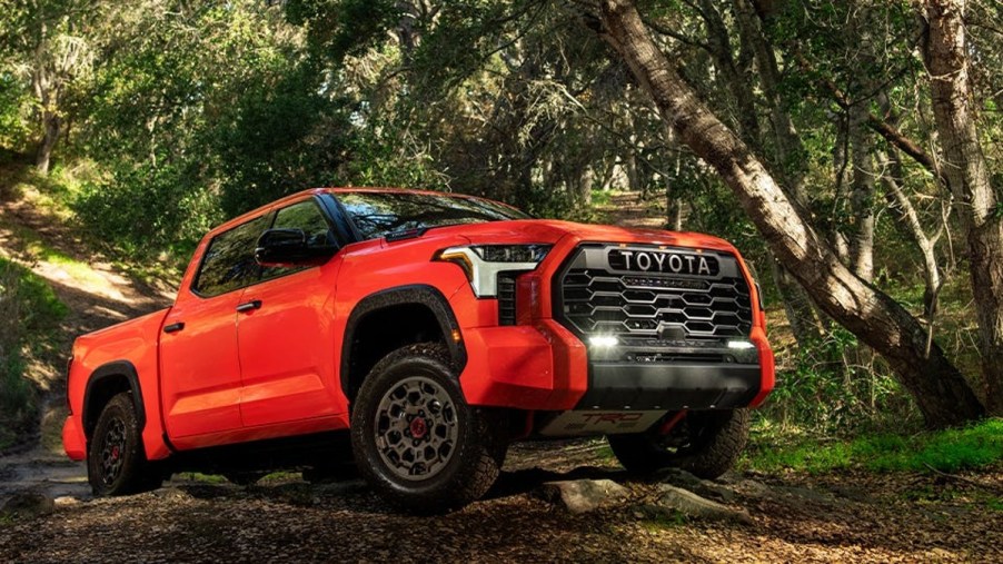 Orange 2022 Toyota Tundra TRD Pro in the woods