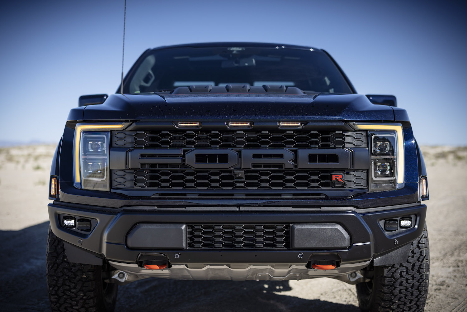 Closeup of the FORD lettering on the 2023 F-150 Raptor R's grille.