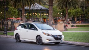 A 2023 Nissan LEAF EV parked on the side of the road