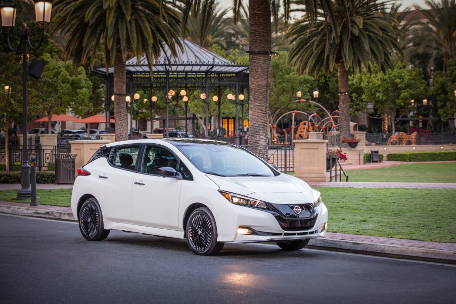 A 2023 Nissan LEAF EV parked on the side of the road