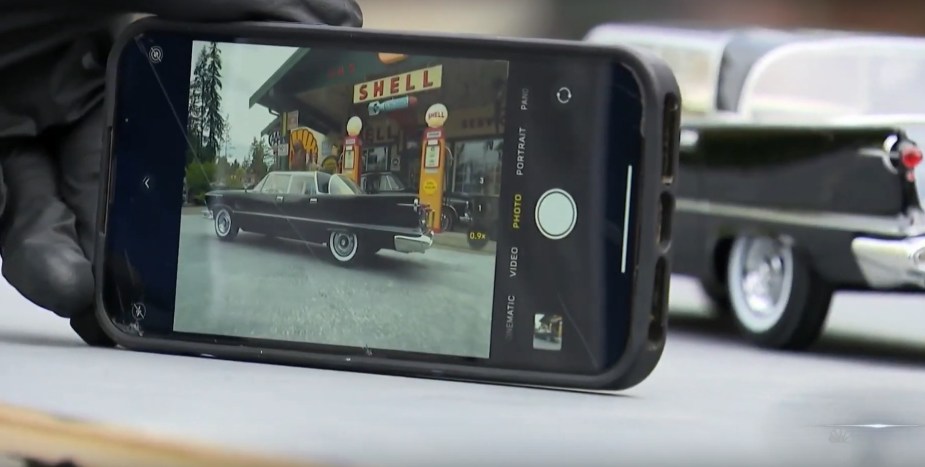 Autistic boy using his iPhone to create a mind-altering photo of a classic car