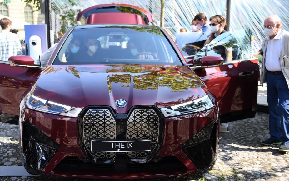 The model of a BMW iX electric vehicle is on display.