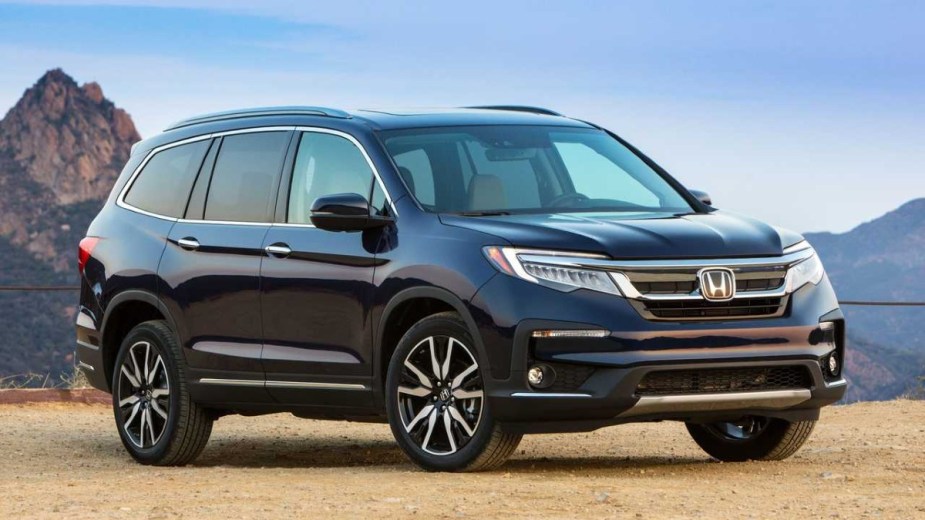 Blue 2022 Honda Pilot Sport posed