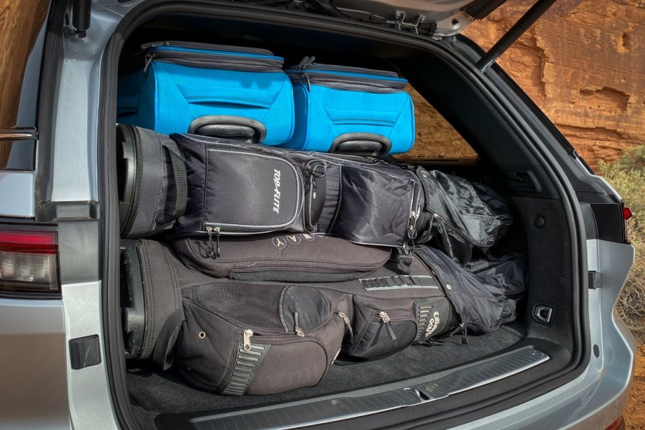 Cargo area in silver 2023 Jeep Grand Cherokee, highlighting its release date and price