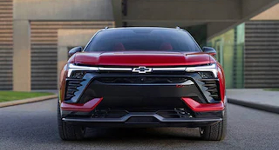 A red 2024 Chevy Blazer EV is parked.