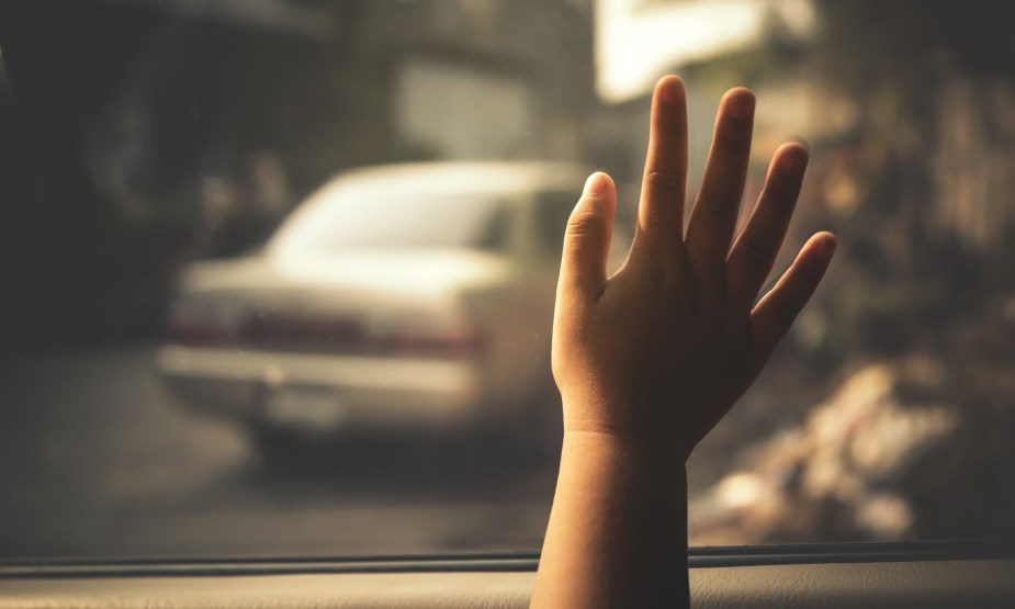 Child's Hand on a Car Window might be a signal of a child on the brink of death