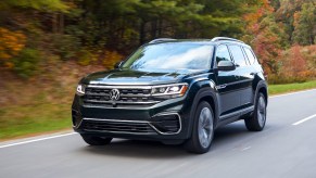 Front angle view of Tourmaline Blue Metallic 2023 Volkswagen Atlas midsize SUV, highlighting its release date and price