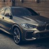 Front angle view of gray 2023 BMW X6 luxury SUV, highlighting its release date and price