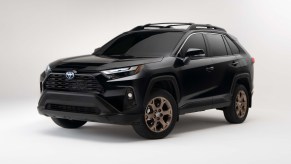 Front view of black 2023 Toyota RAV4, highlighting its release date and price