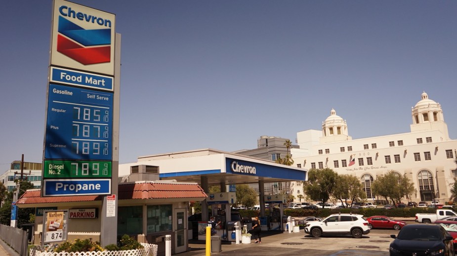 A Chevron gas station displaying high gas prices that RV travelers are trying to beat. 