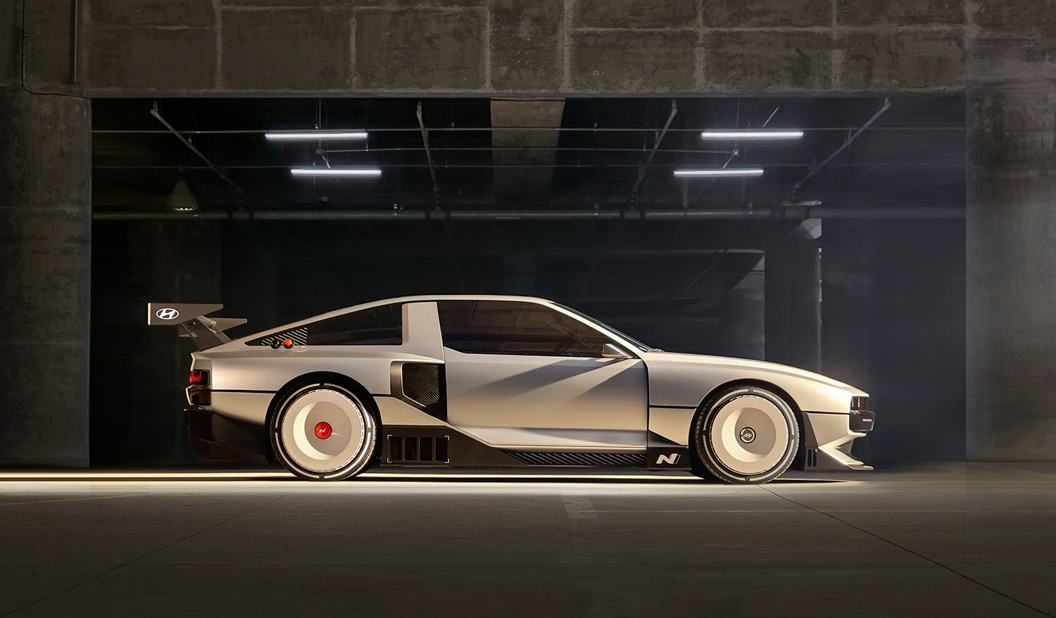 Hyundai N Vision 74 Electric Sports Car Concept side view parked in Hangar