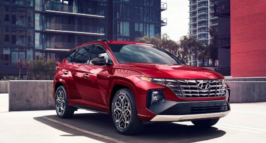 A red 2022 Hyundai Tucson N Line compact SUV is parked.