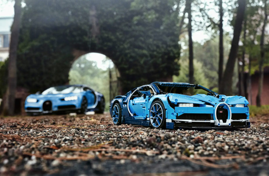 Lego Bugatti Chiron parked next to a real Bugatti