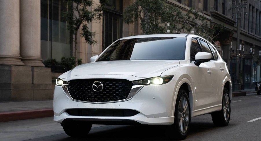 A white Mazda CX-5 compact SUV.