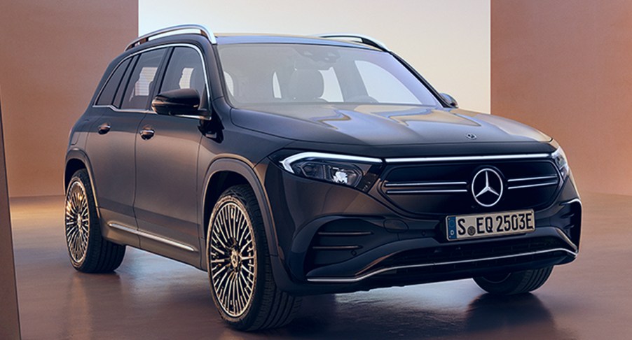 A blue 2023 Mercedes-Benz EQB luxury compact SUV is parked.