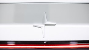 A white Polestar, maker of the Polestar two logo.