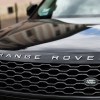 Range Rover logo on hood of car, potentially a 2023 land Rover Discovery.