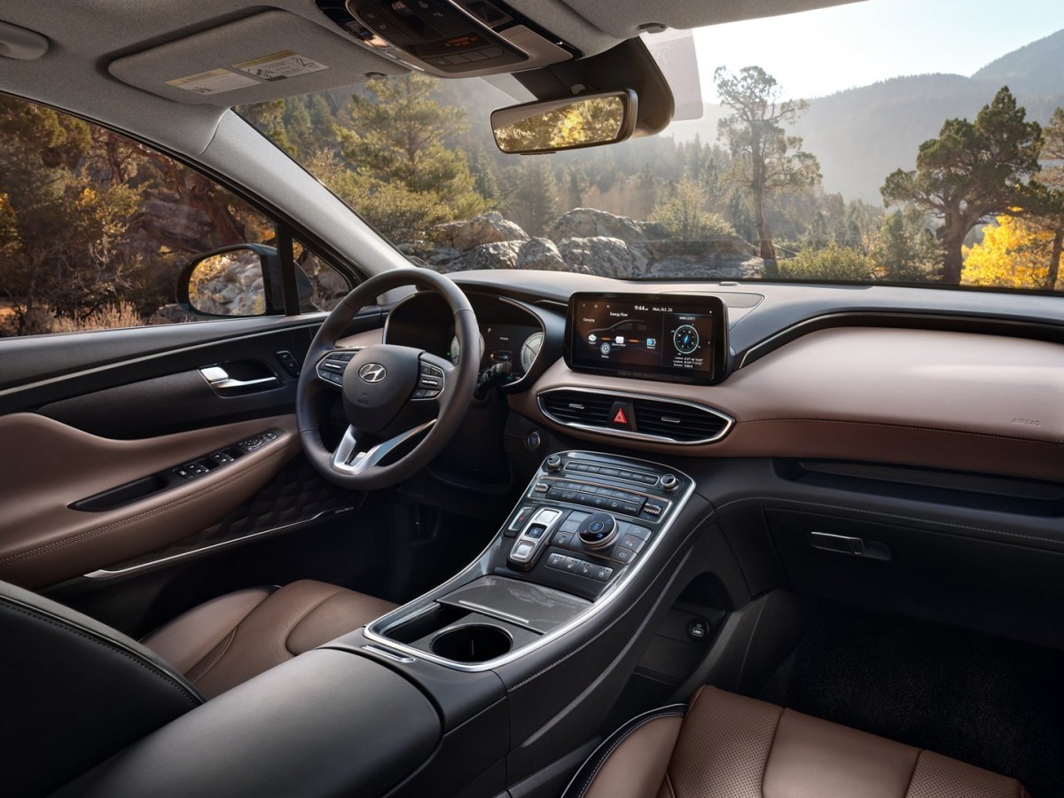 the interior of the 2022 Hyundai Santa Fe in brown and black 