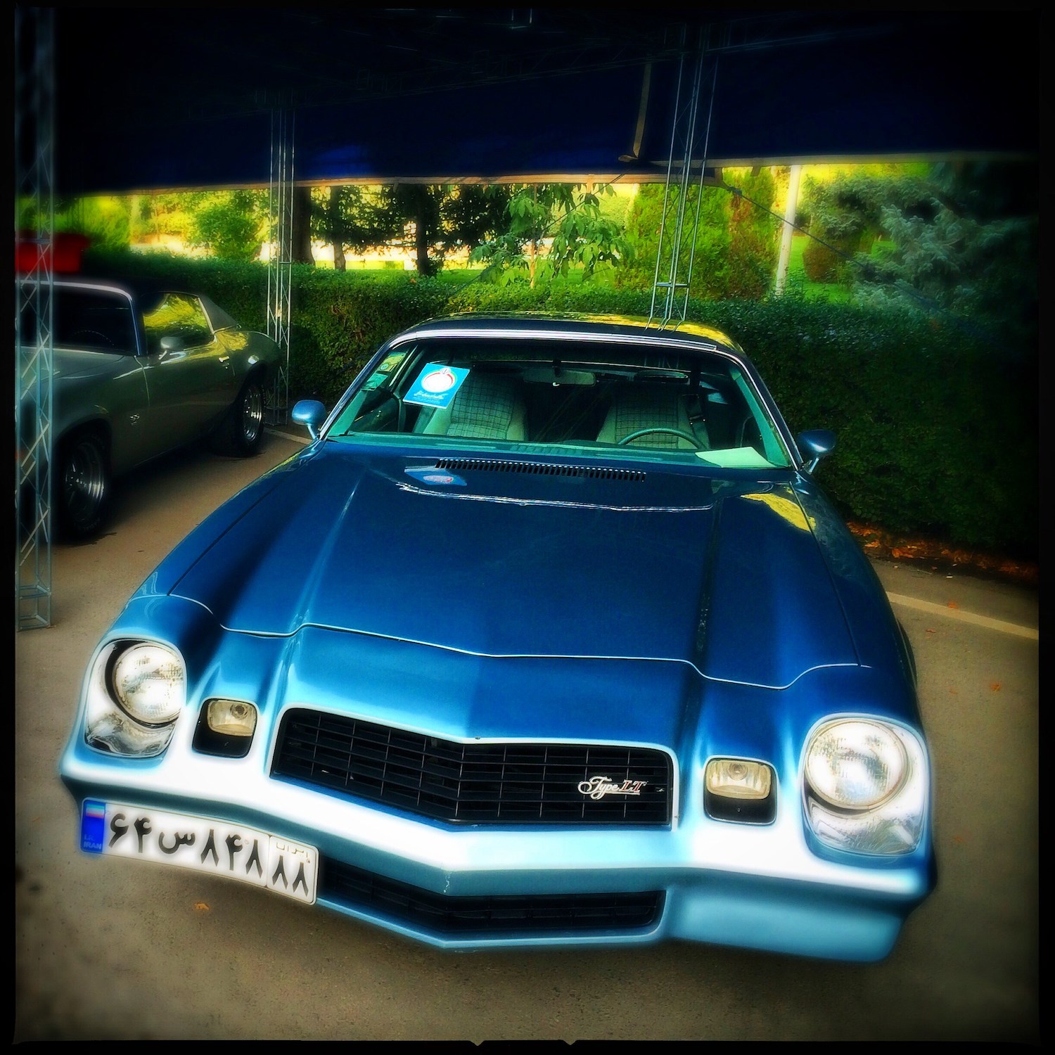 Blue second generation Camaro muscle car like the iconic vehicle from Stranger Things.