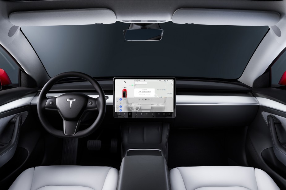 A Tesla Model 3's interior is simple yet befitting of a luxury car.