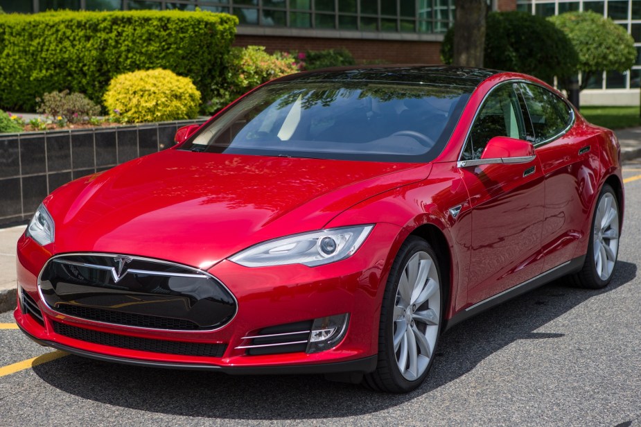 An early Tesla Model S, like this red one, is an used Tesla that shoppers can buy for under $40,000.