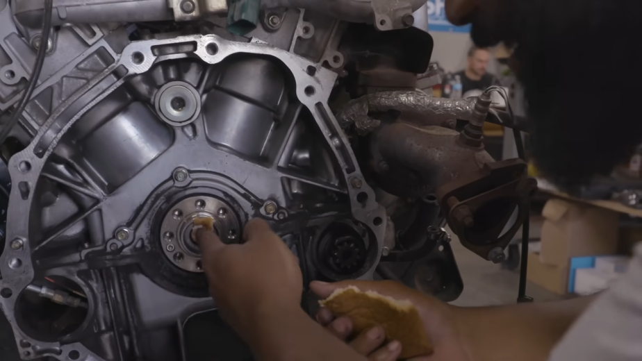 A screen shot of bread being stuffed into a pilot bearing hole.