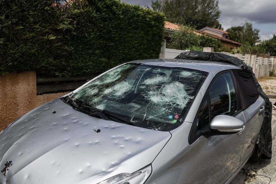 car driving hailstorm