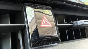 An emergency or hazard lights button