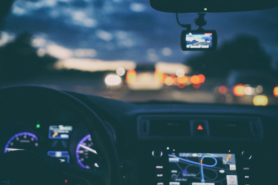 An interior view of a car with the GPS map on the center console.