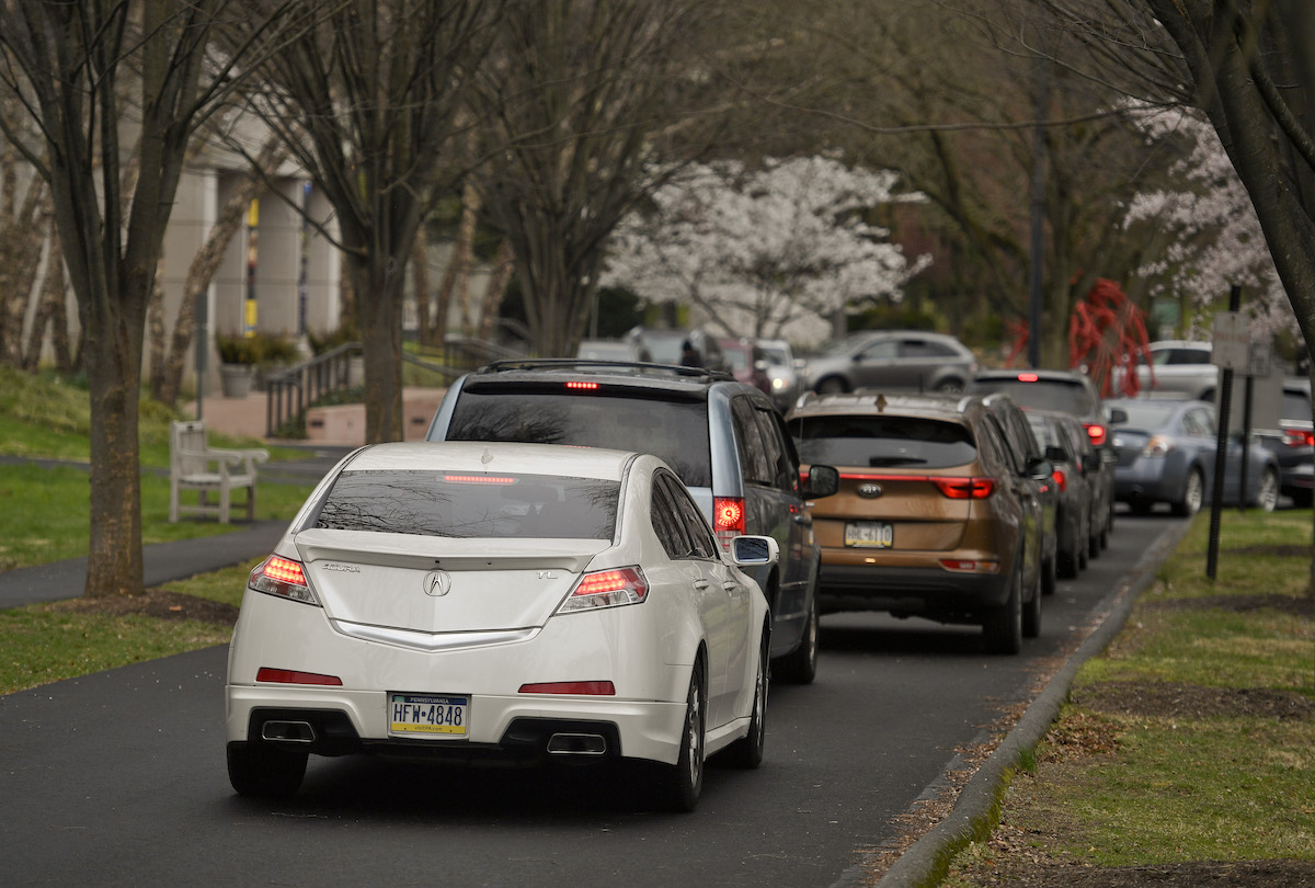 School pickup and drop-off, school car line, student pickup and drop-off