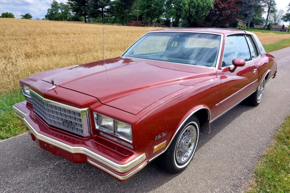 a red 1980 Monte Carlo