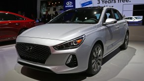 A silver 2017 Hyundai Elantra parked indoors.