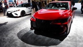 A red and white 2018 Toyota Camry.