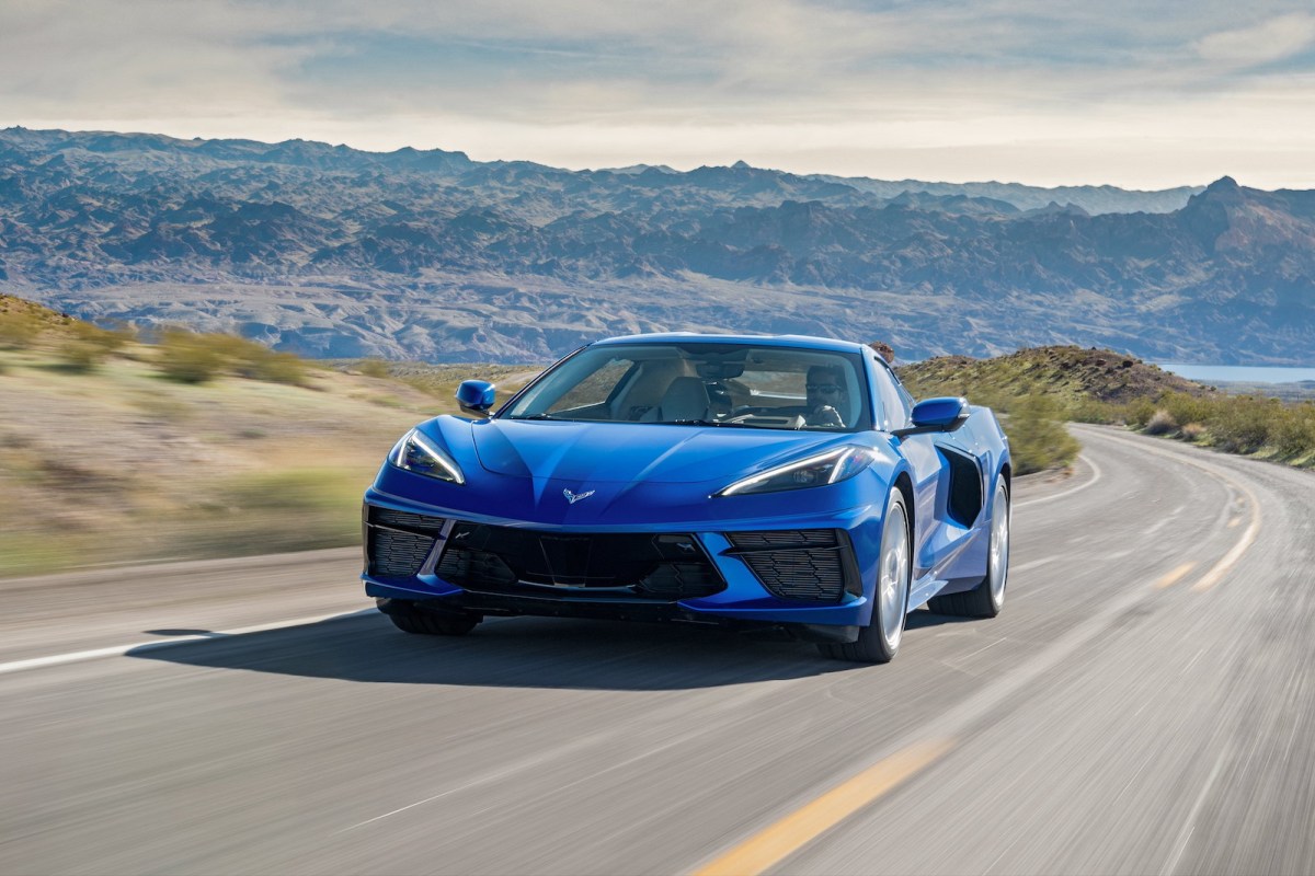 A blue 2020 Chevrolet Corvette driving