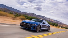 A blue 2022 Audi e-tron GT driving