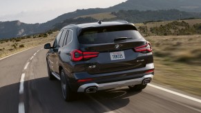 The rear of a black 2022 BMW X3.