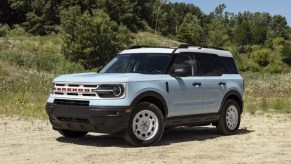 An ice blue 2022 Ford Bronco Sport driving in the desert.