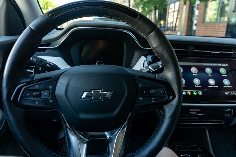 A 2022 Chevrolet Bolt EUV Premier's black-and-silver steering wheel with Super Cruise controls