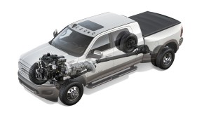 Cutaway of a white heavy-duty Ram pickup truck to showcase its Cummins engine.